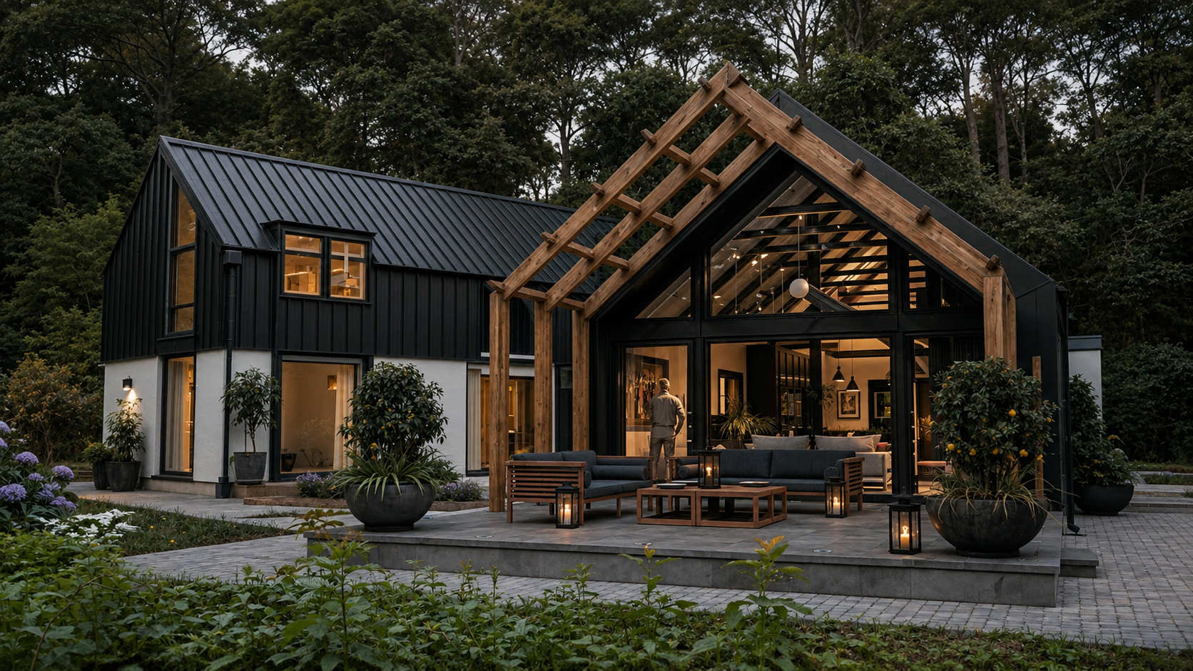 Contemporary new build home by Usonia Architects in Donegal combining a traditional cottage form with a modern two-storey barn-style extension and glazed timber entrance pavilion.
